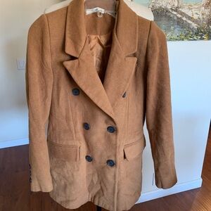 Pretty rust brown peacoat with double breasted design.